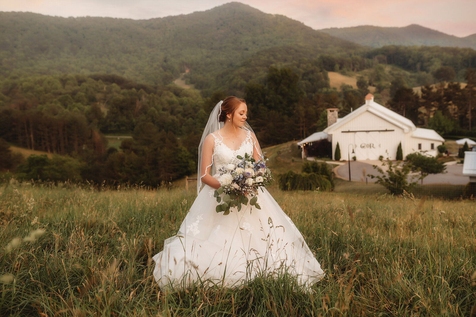 Bride poses for Wedding Photos at Chestnut Ridge Events in Asheville, NC.