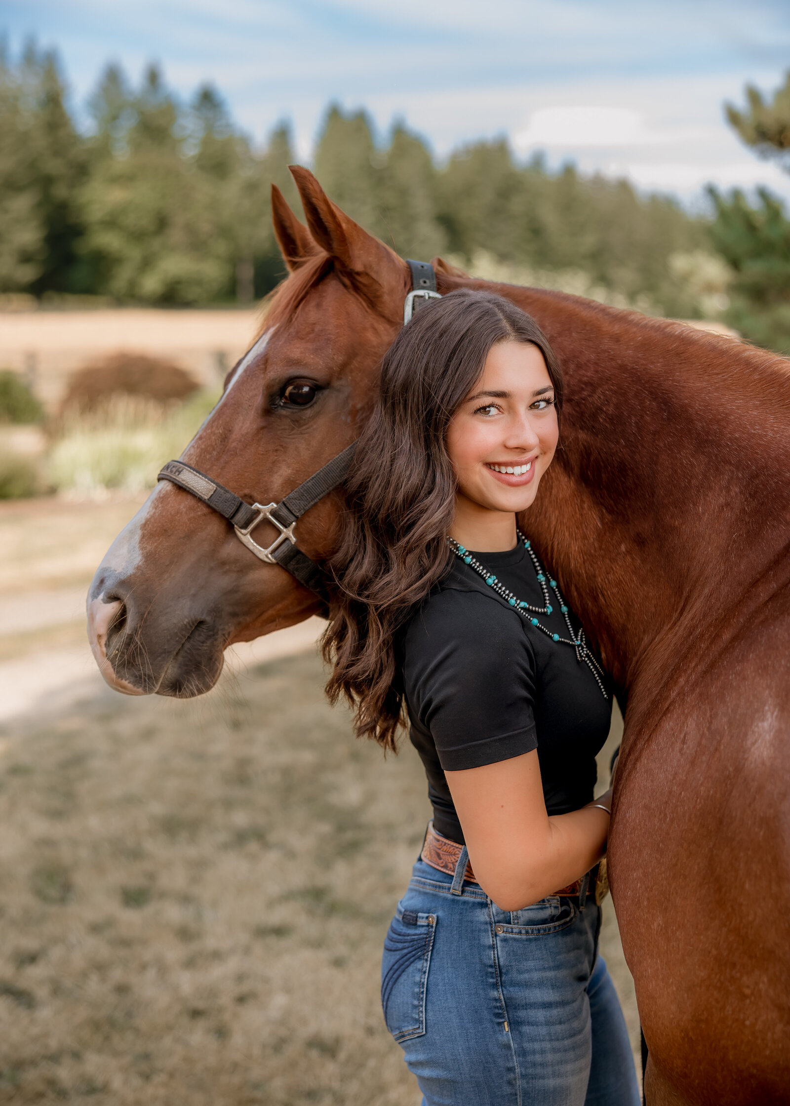 Sam Barlow High school Senior taking senior portraits with her horse