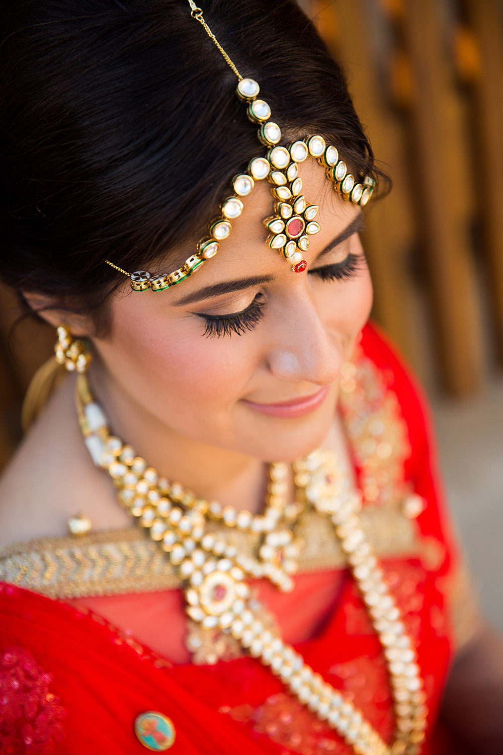 Lovely Indian Bride with Jewelry and Red Sari