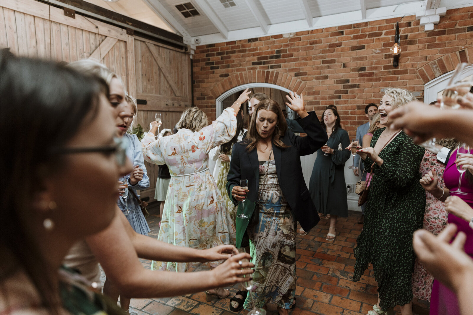 Guests dancing at the farm yarra valley taken by wedding photographer Ada and Ivy