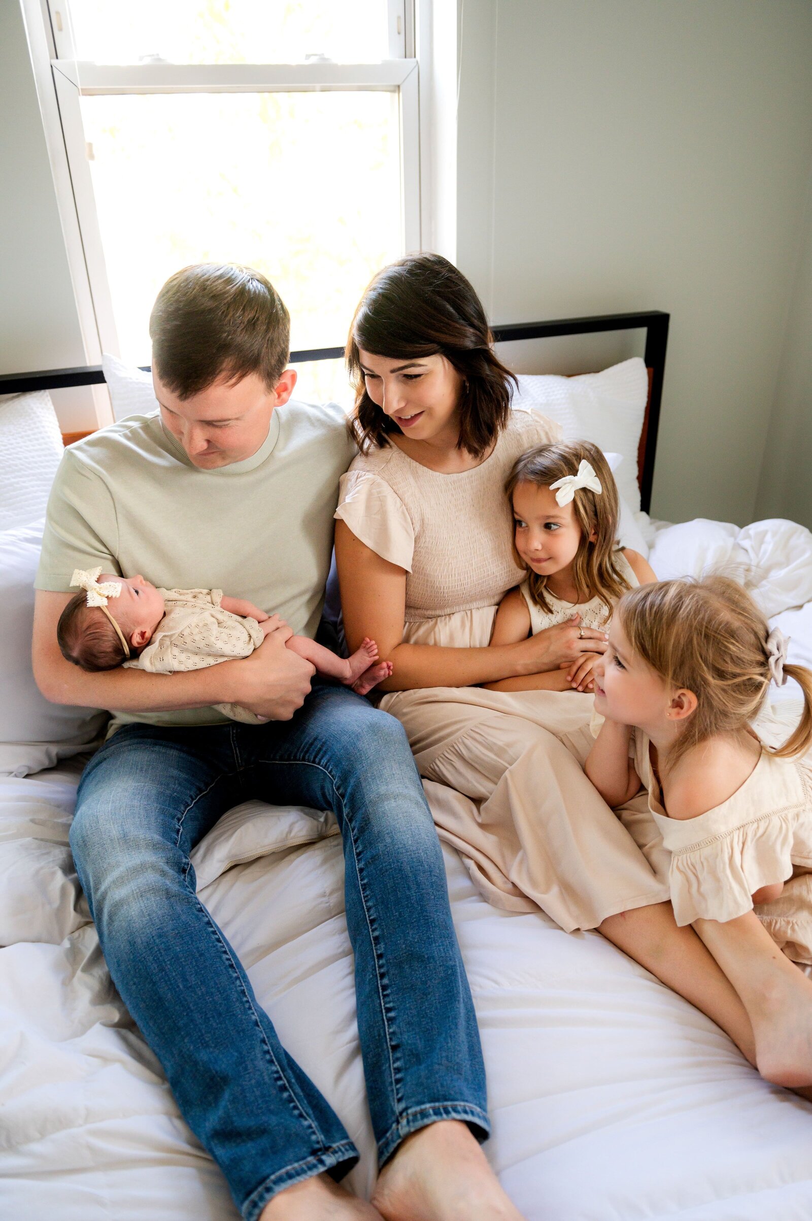 family in their Baltimore City home during a newborn session