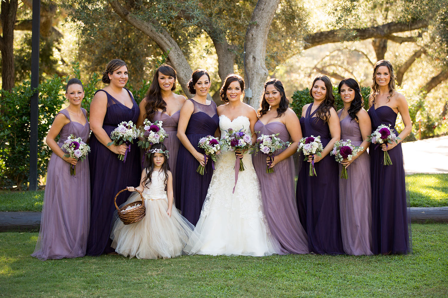 bridal party with cute flower girl