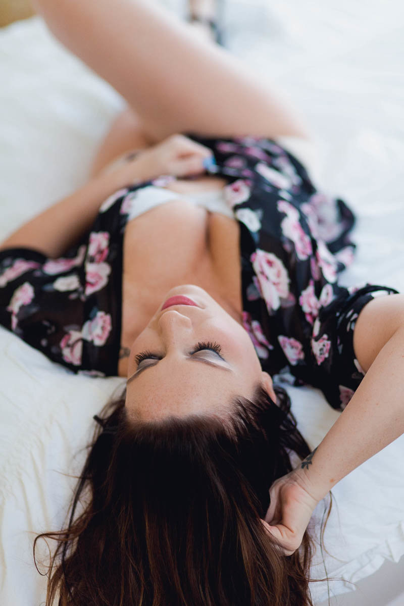 Ms L wears floral kimono over white lingerie in bed, Boudoir Photography, Charleston, SC