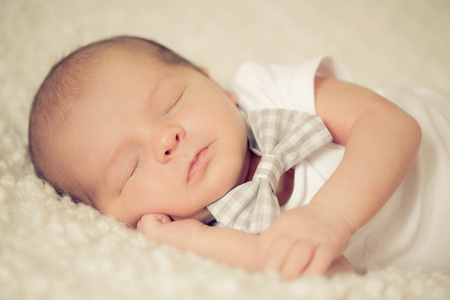 san diego newborn photographer | newborn with cute bow tie sleeping