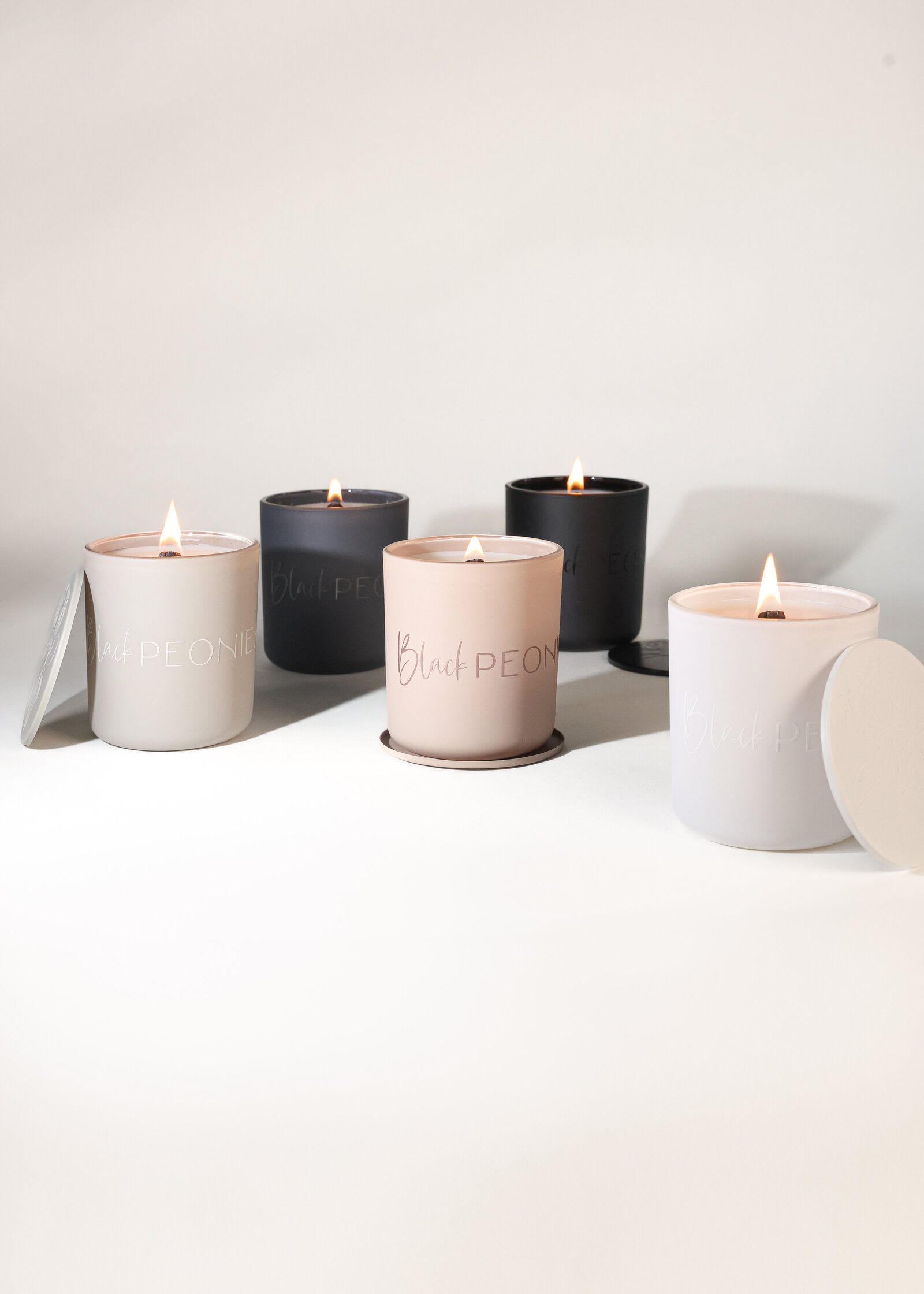 Minimal clean luxe product photography for candles. Small business product photographer in San Diego.