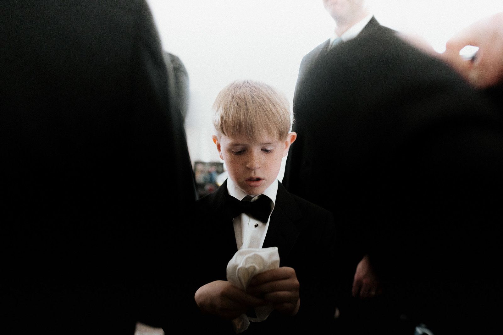 photo of ring bearer taking his job seriously at the grant humphrey's mansion.