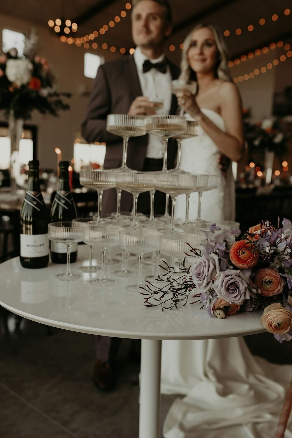 wedding bar under string lights