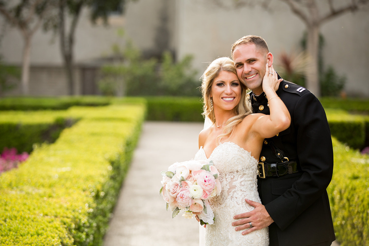 bride in groom in balboa park for their prado wedding