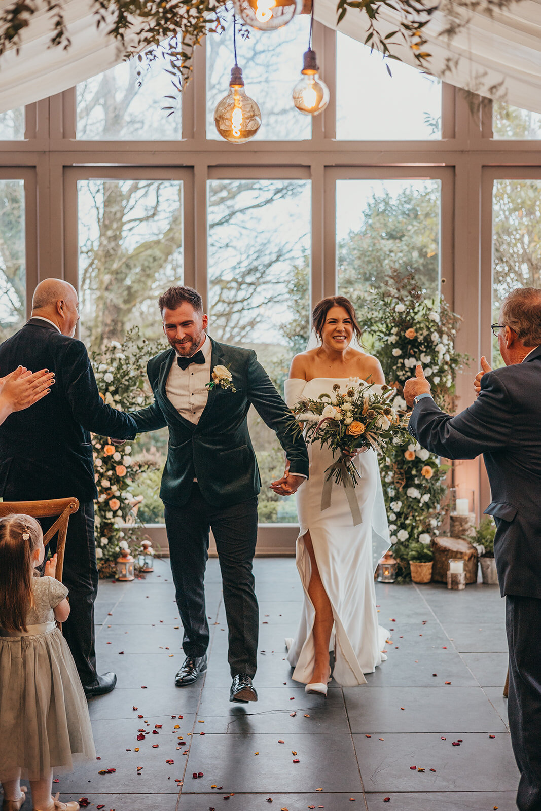 bride and groom applauded