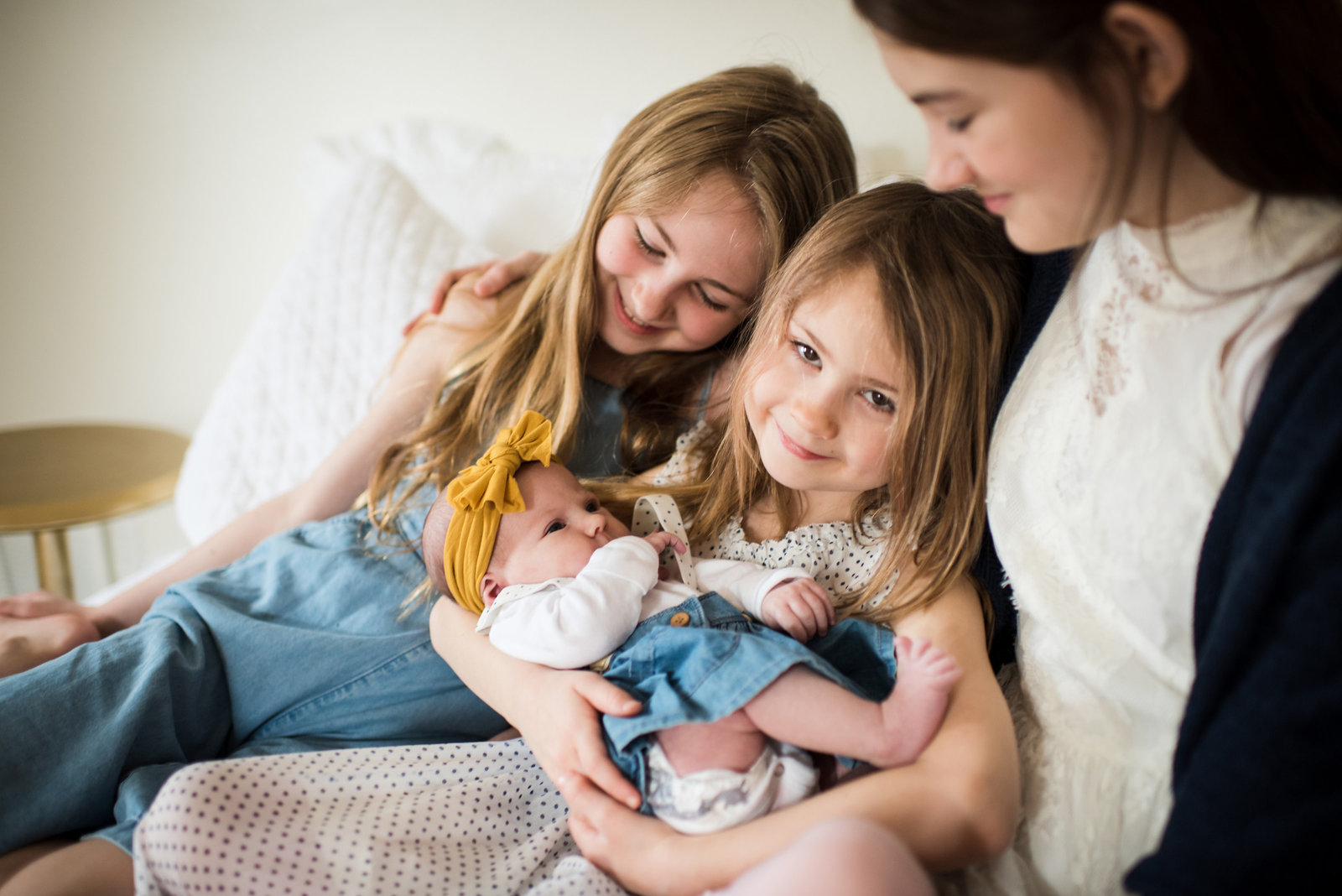 Newborn Photo with Sisters
