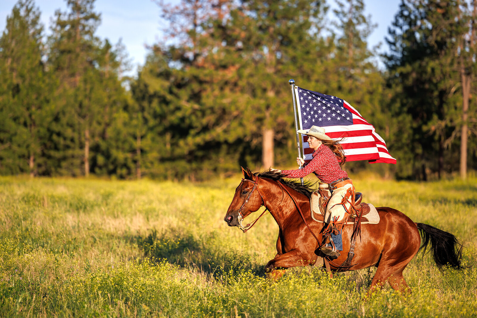cowgirl-american-flag-galloping-horse