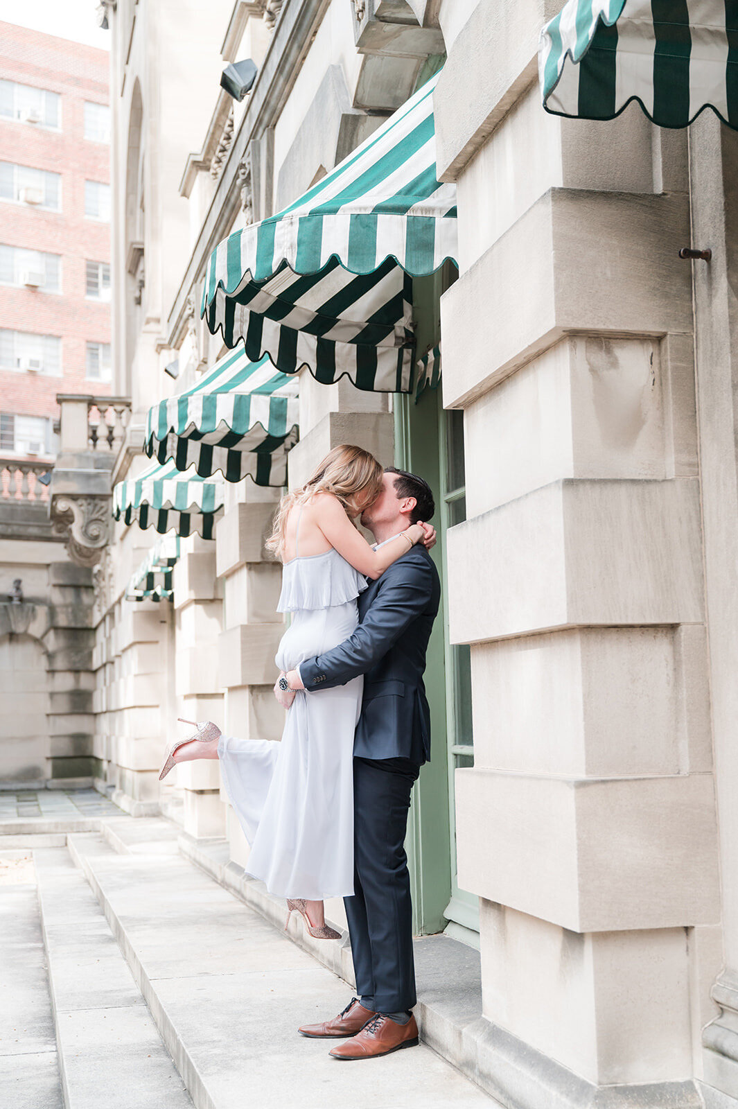 Larz Anderson House engagement photo in Washington DC with couple walking outdoors.4