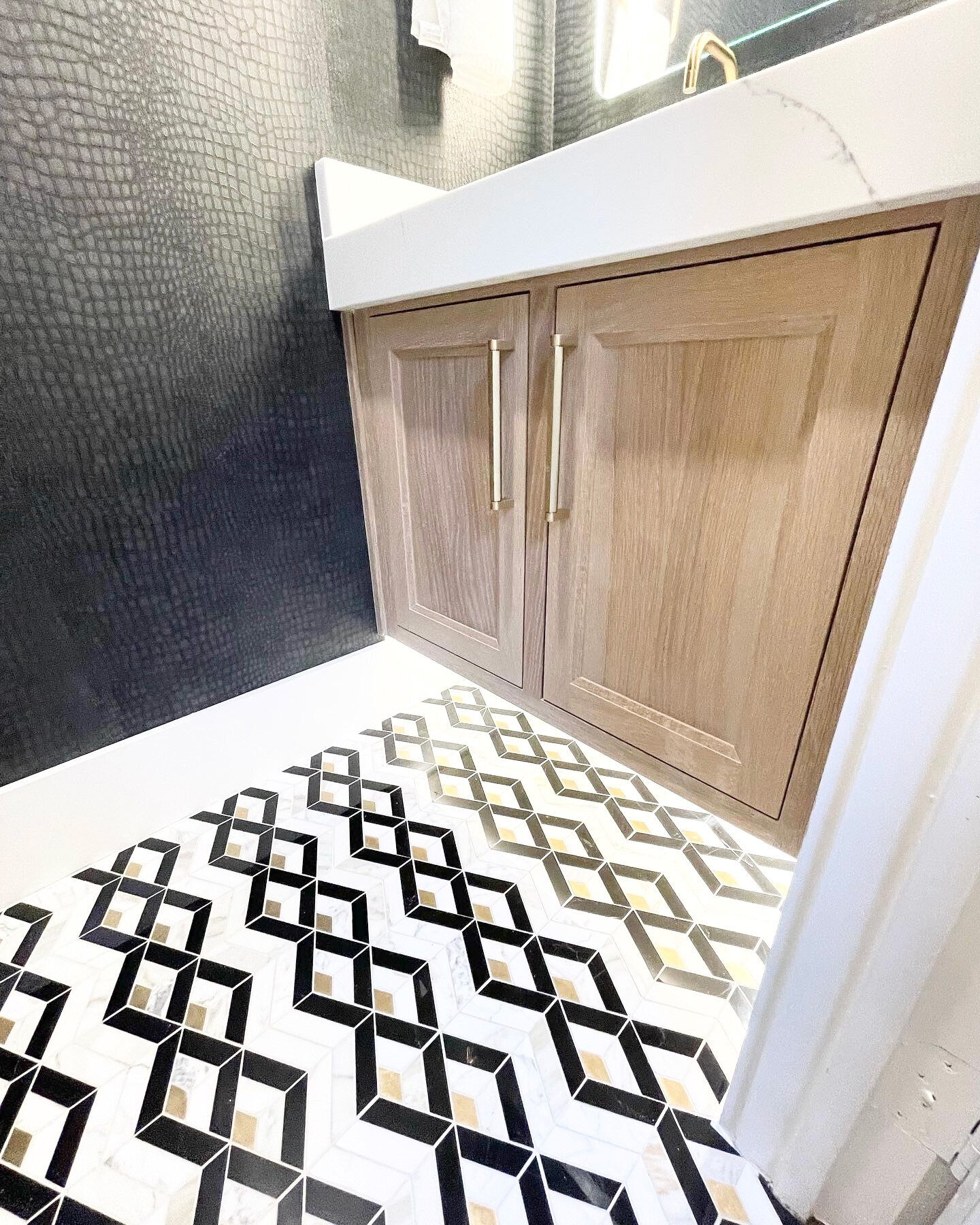 Renovation design services for a kitchen floor featuring an elegant touch, with high-quality materials, modern finishes, and a sophisticated color scheme that enhances the overall aesthetic and functionality of the space.