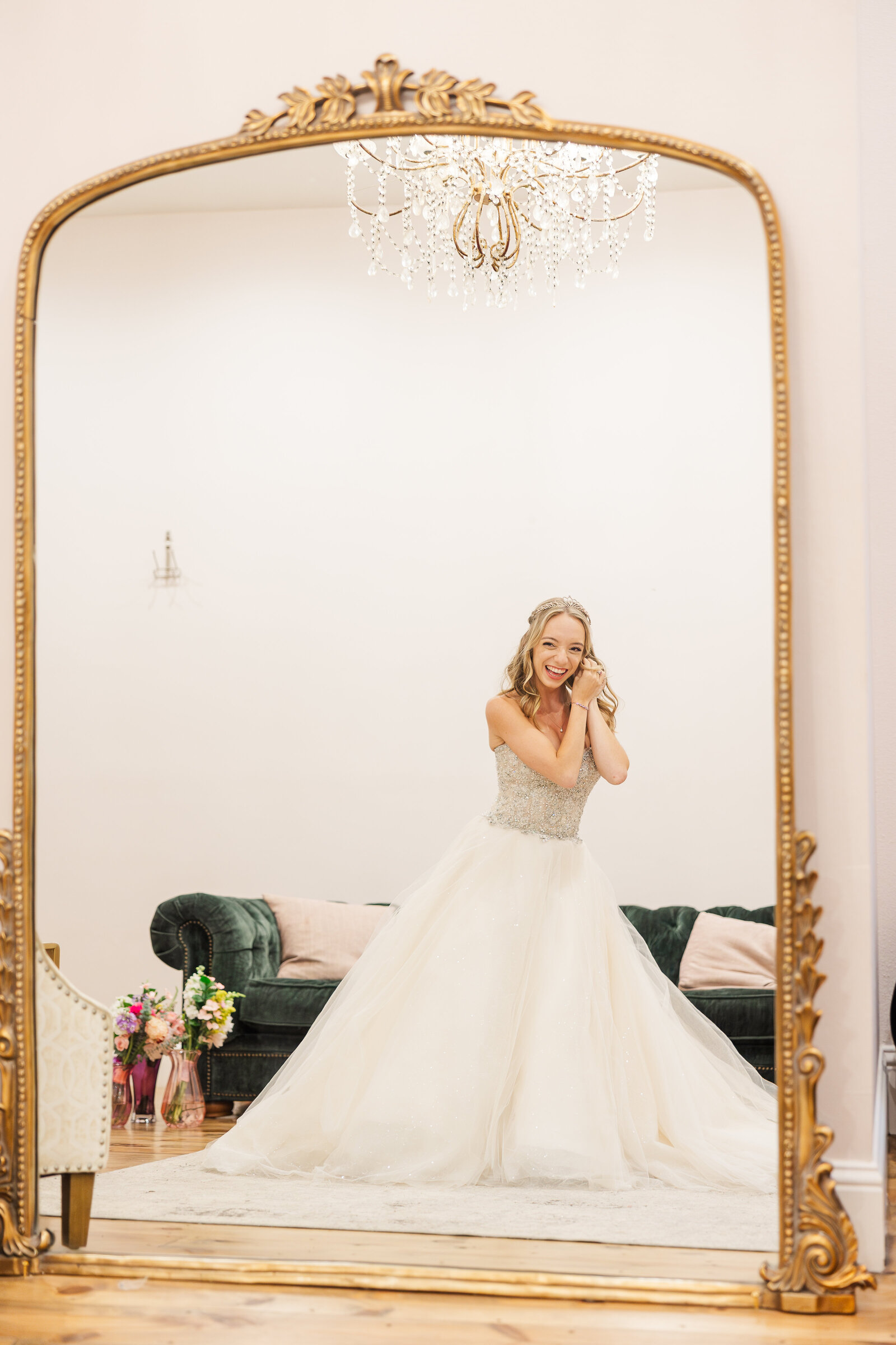 Bride-getting-ready-looking-in-the-mirror-smiling