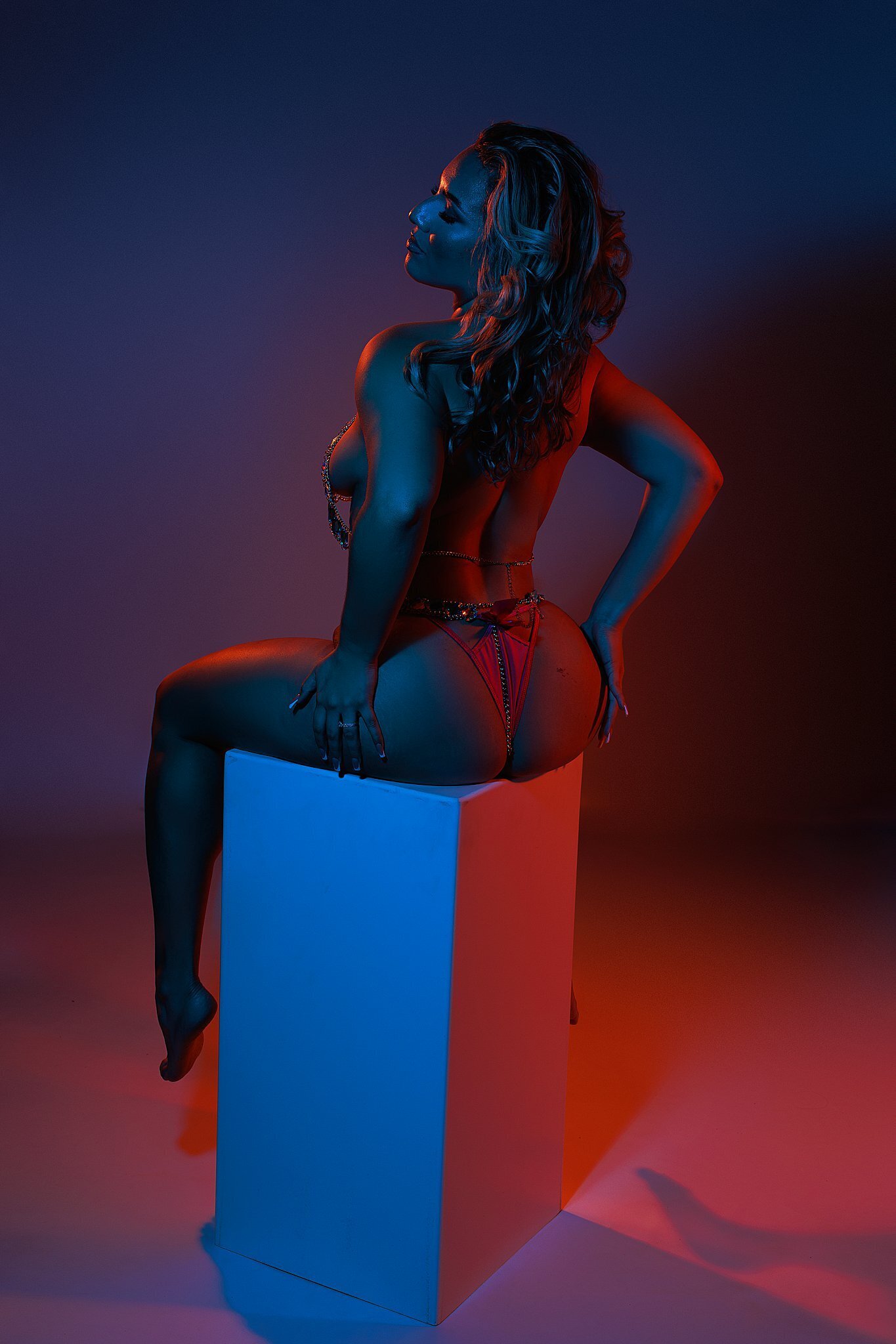 Boudoir portrait in Austin studio with dramatic lighting
