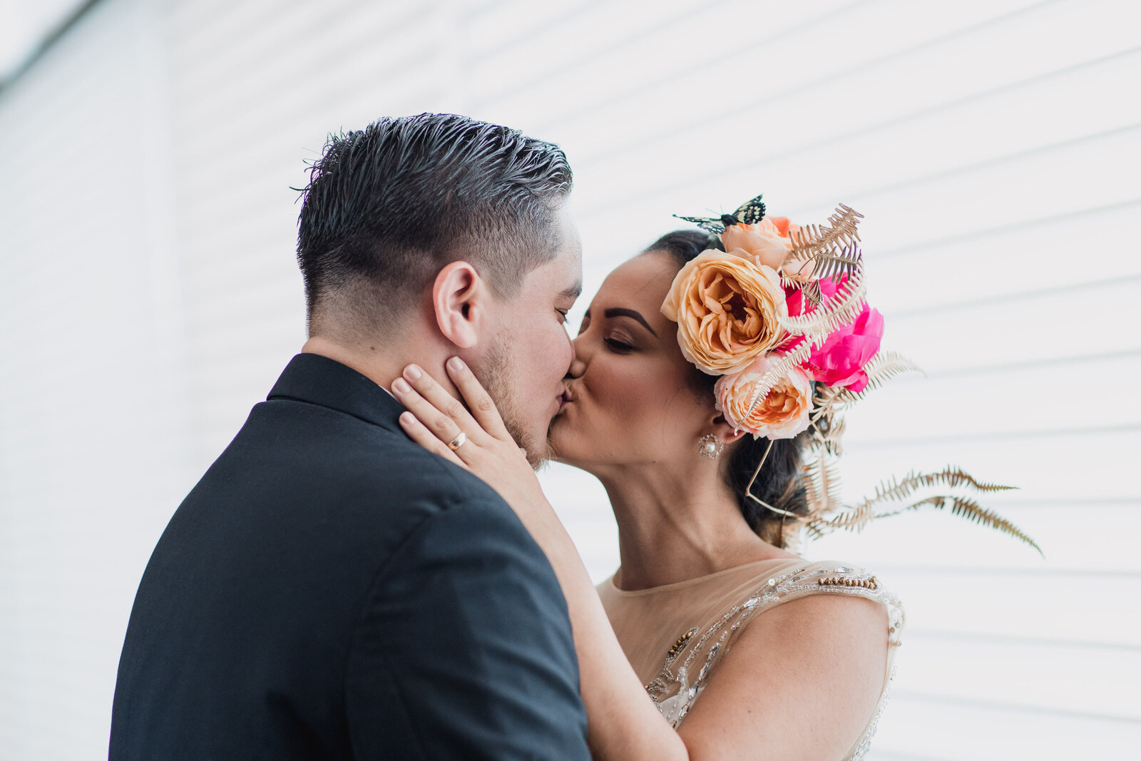 Canva - Bride and Groom Kissing