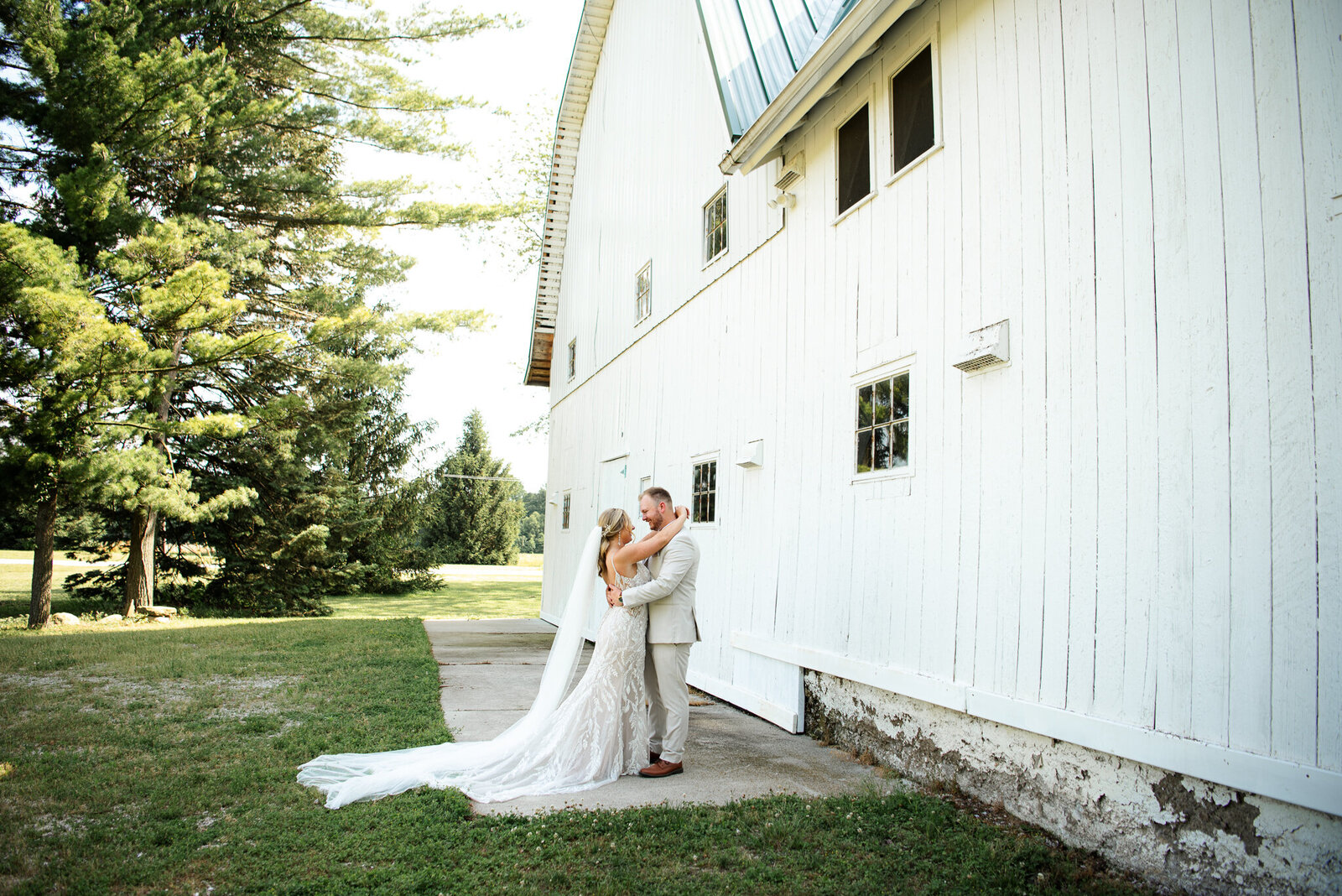 bride-groom-white-barn