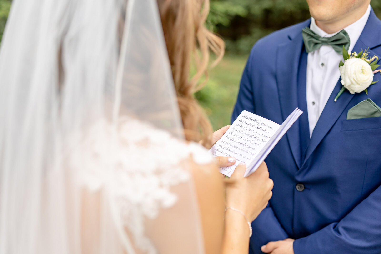 bride and groom exchanging vowels