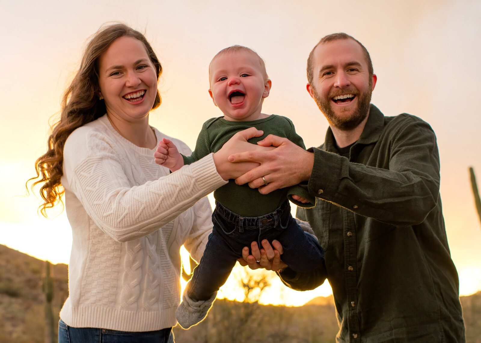 mother and father with baby boy in Ahwatukee desert