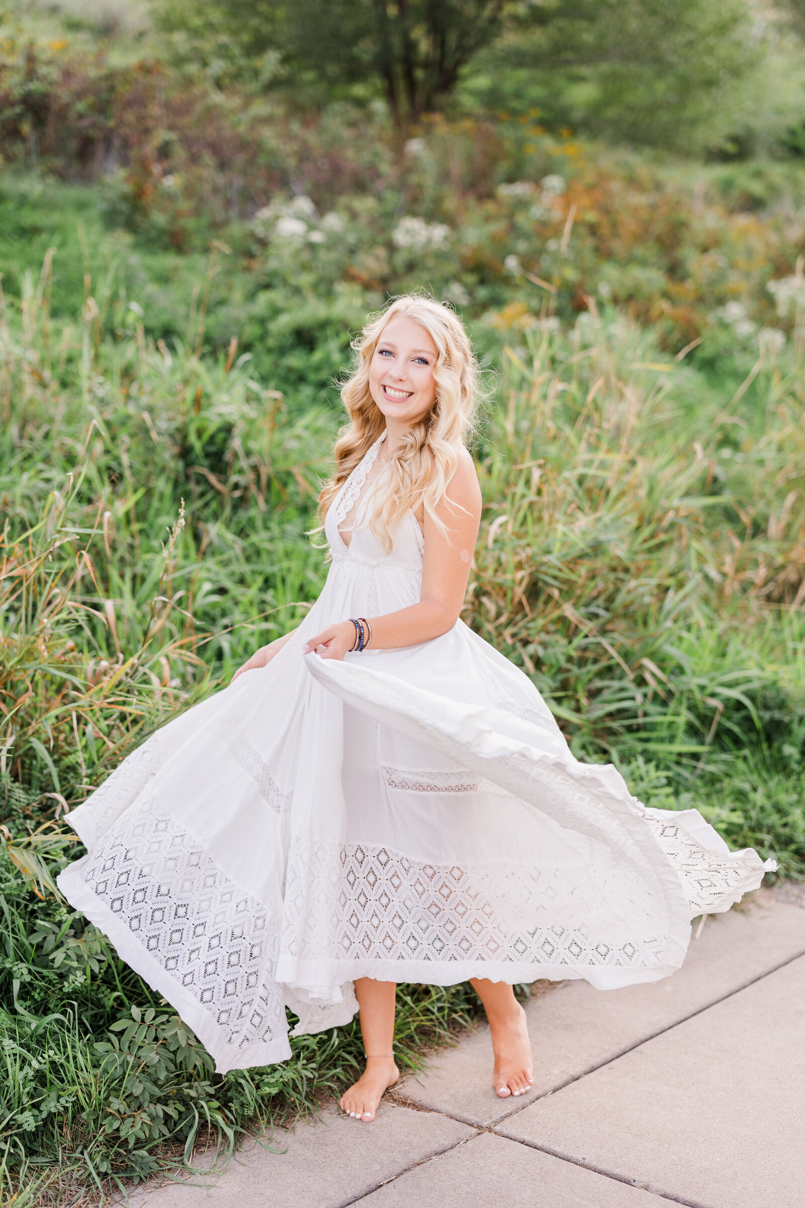 senior-girl-twirling-with-dress