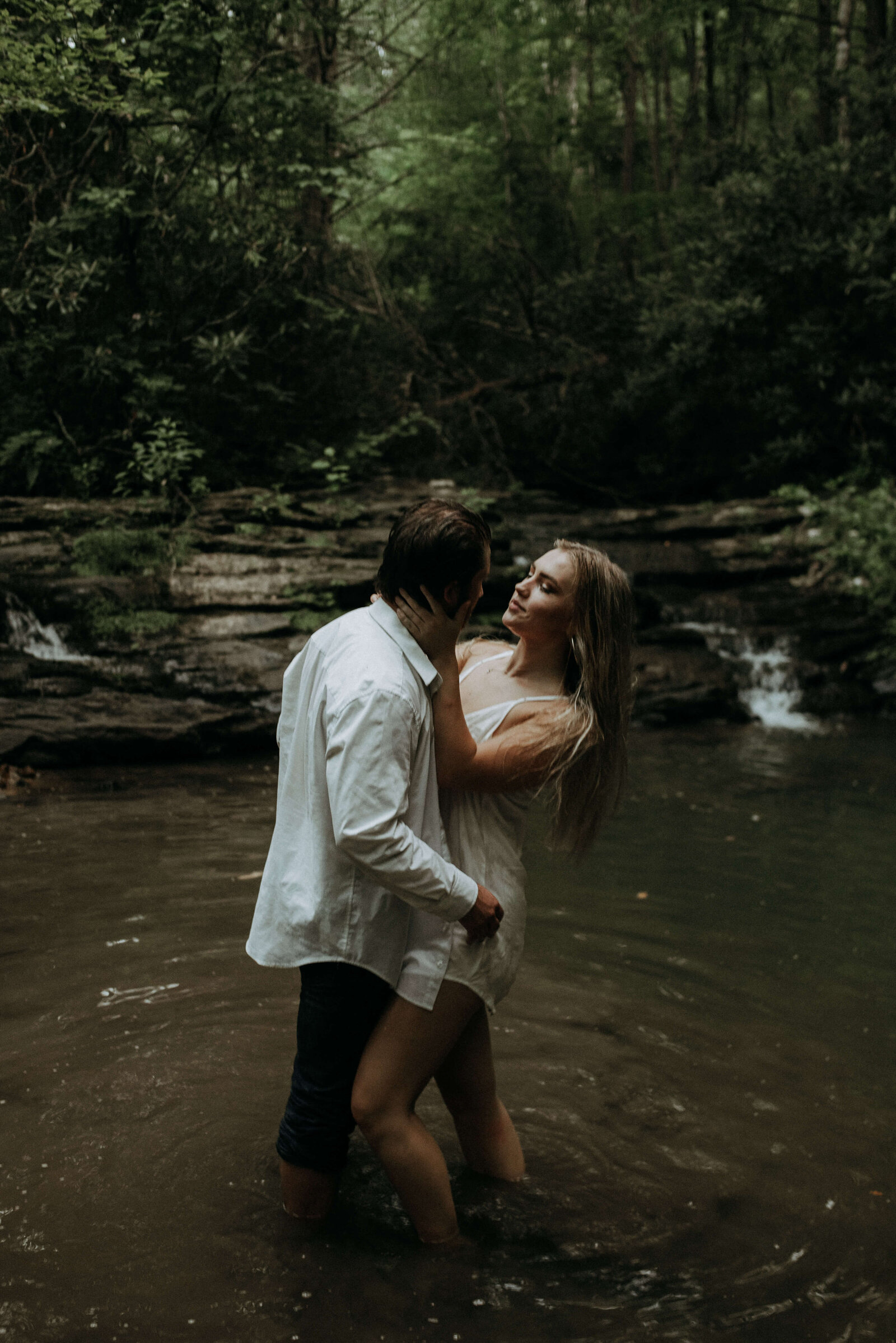bride and groom portraits in water