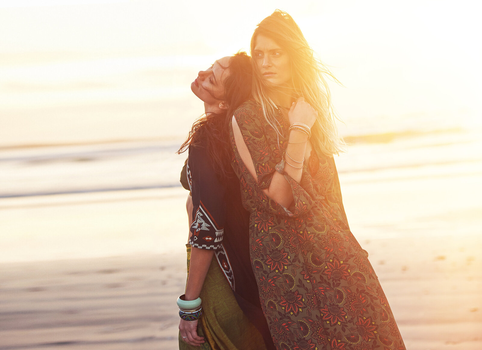 boho-kinda-day-two-young-women-spending-the-day-at-the-beach-at-sunset
