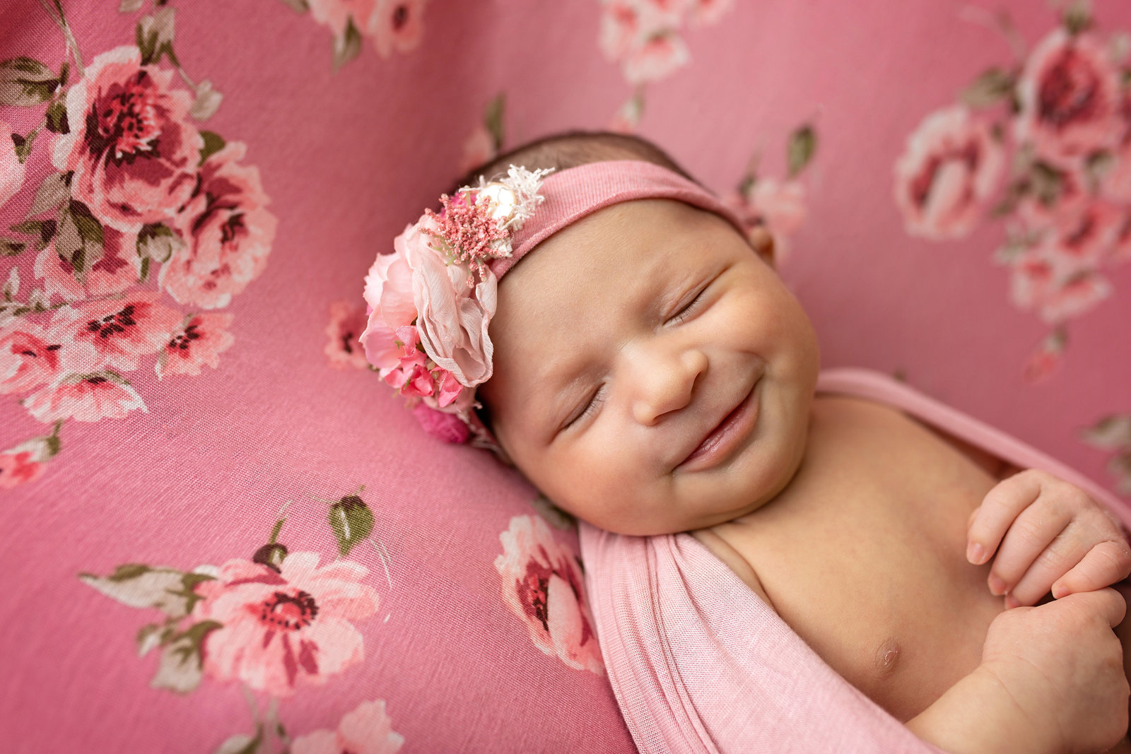 newborn smiling