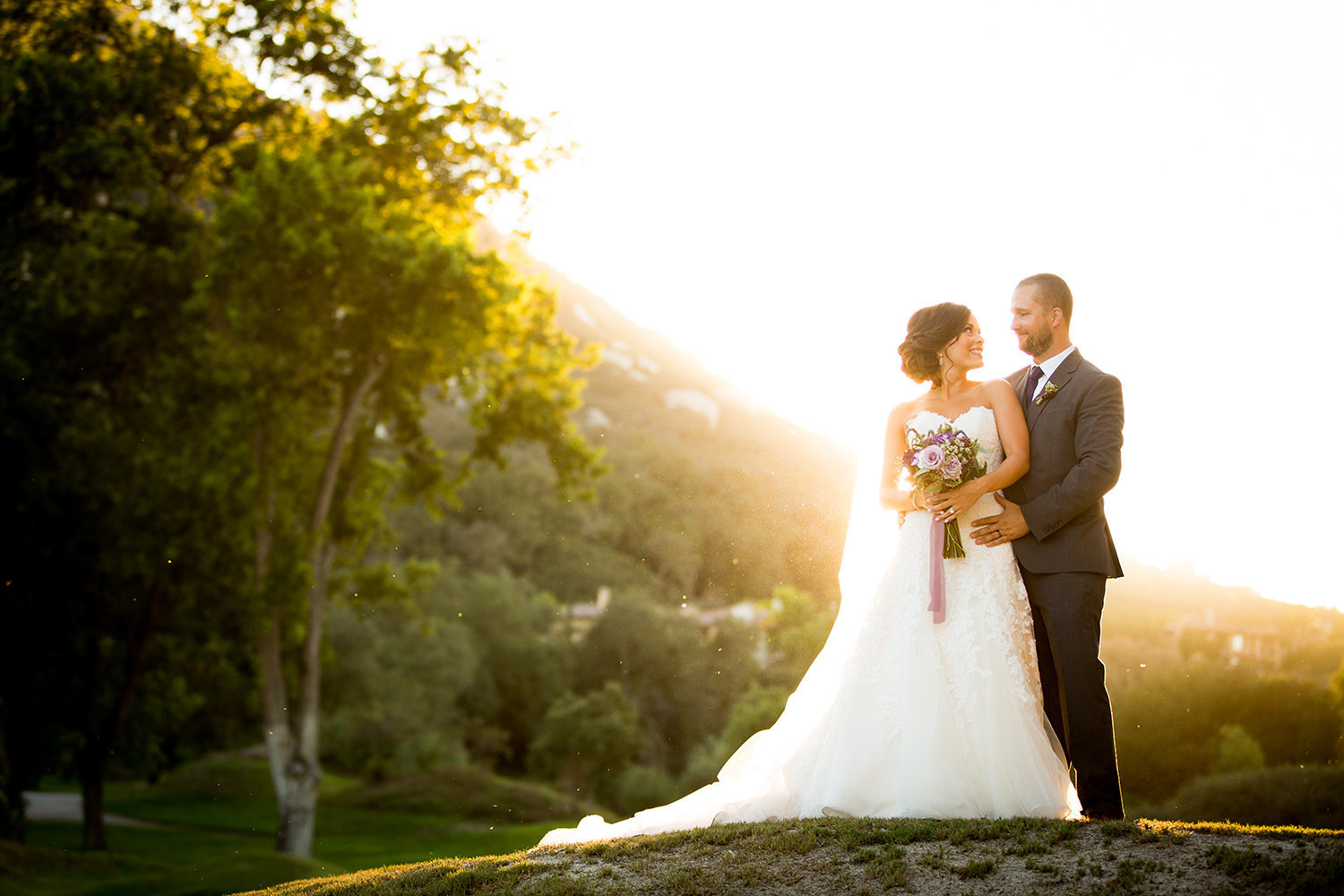 bride and groom with beautiful back lite