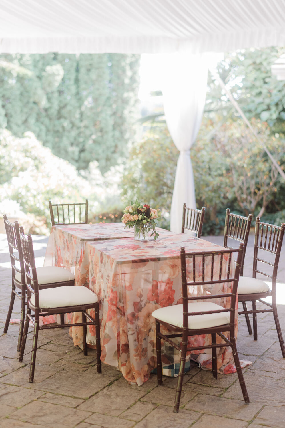 Floral table under a white tent