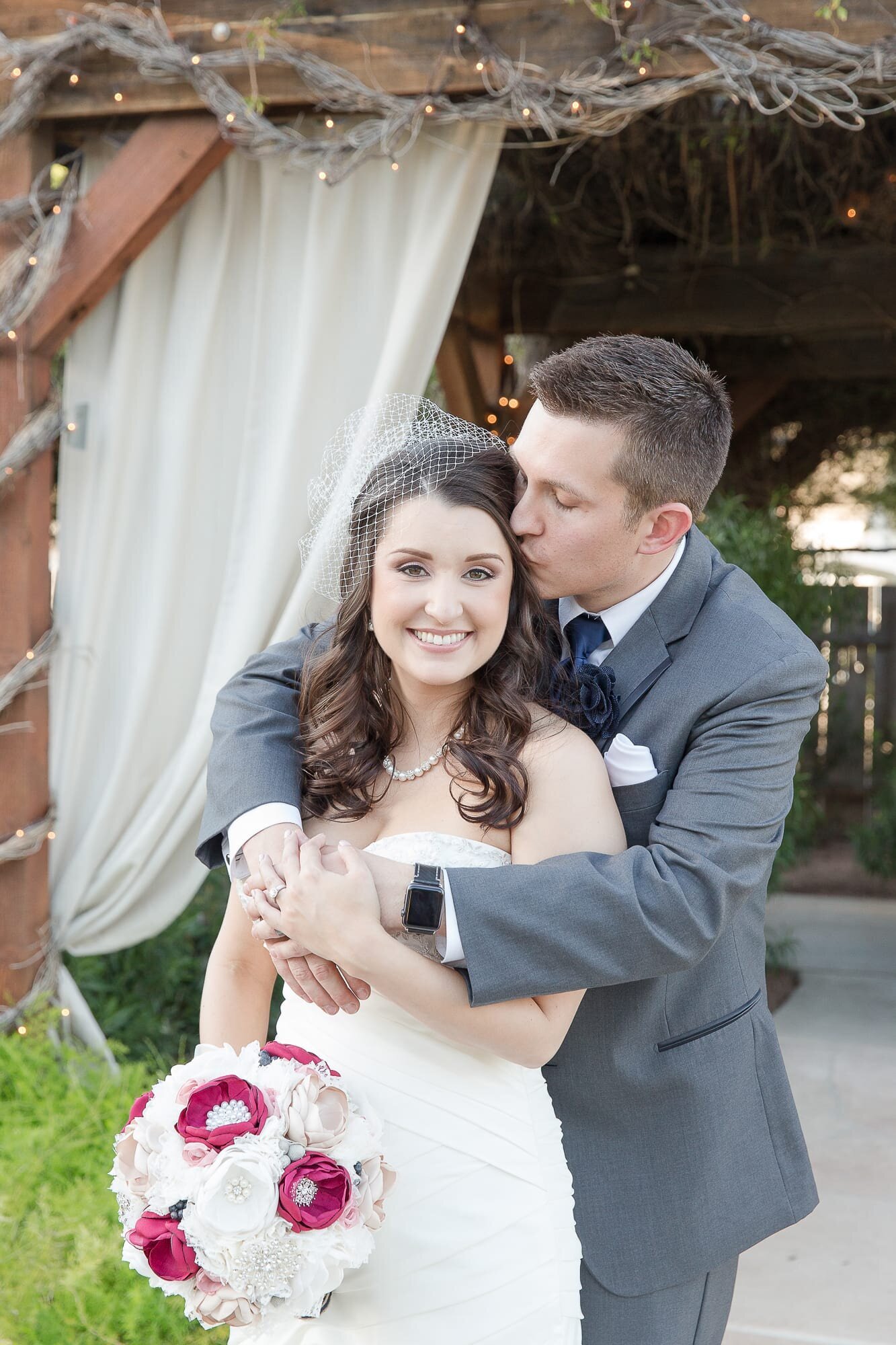 groom-hugging-and-kissing-bride-shenandoah-mills