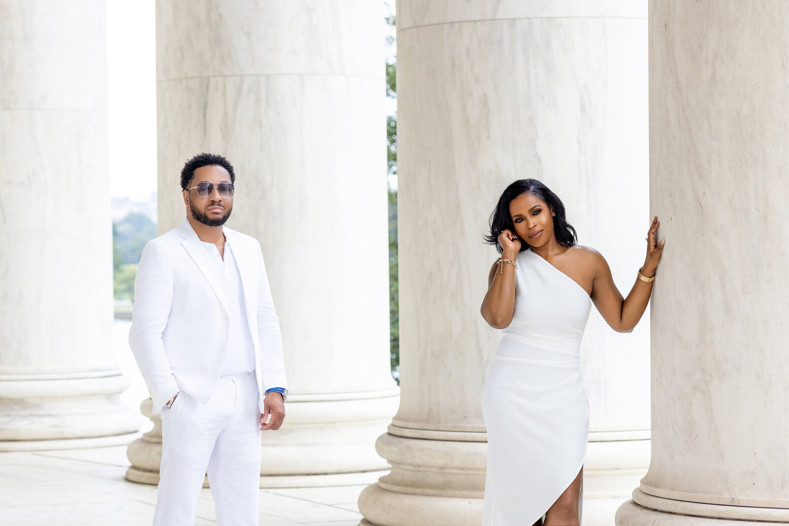 couple in white posing