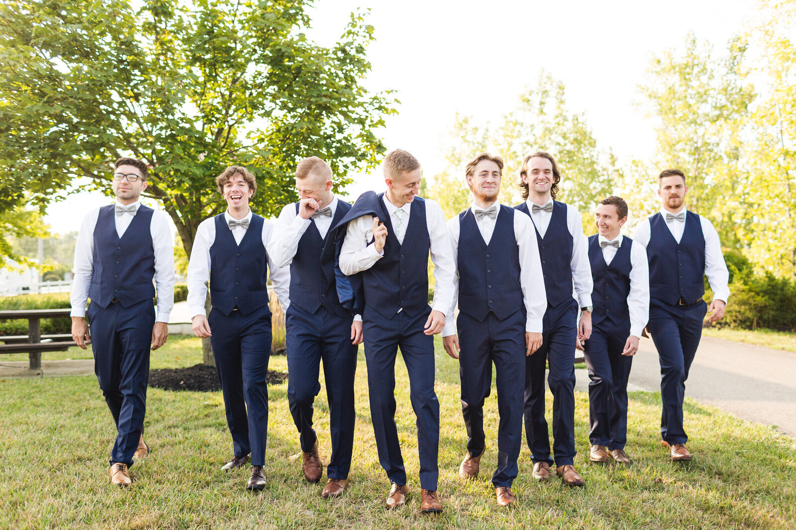 groomsmen-laughing-walking-together-summer-wedding-ohio
