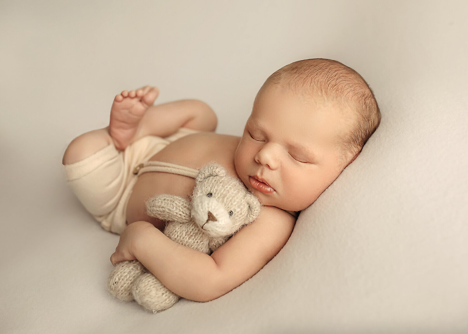 baby boy newborn session in ashley mcclintock photography studio 5
