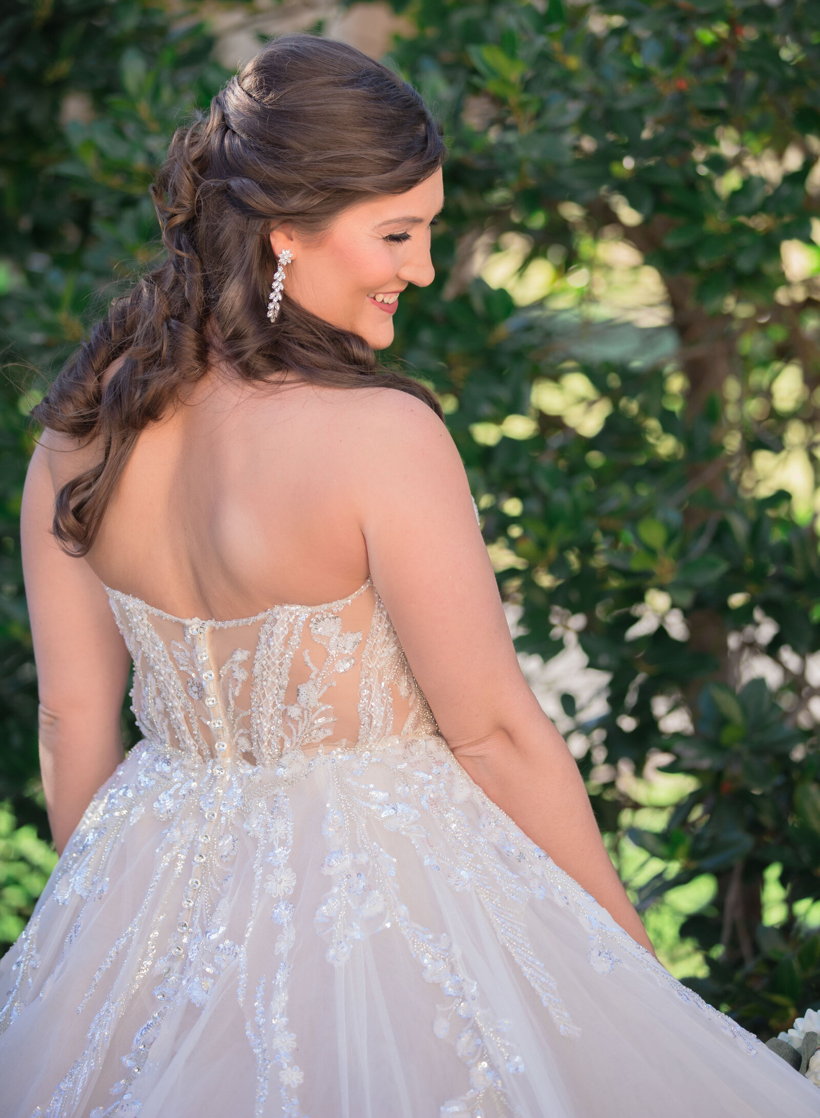bride with sheer back wedding dress