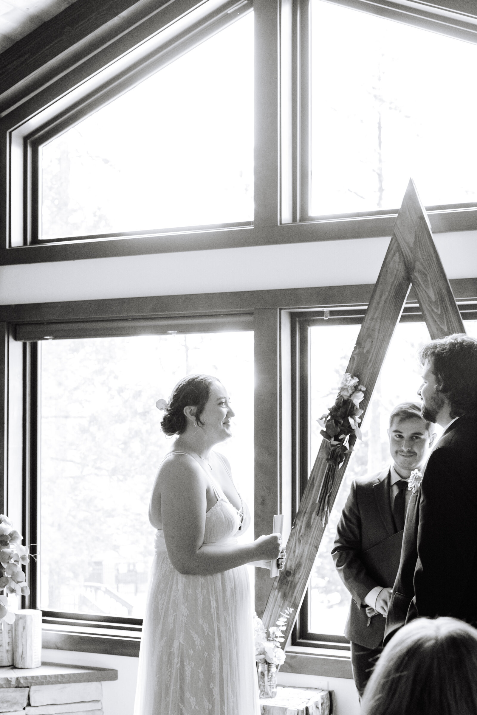 A couple celebrates their intimate elopement at a cabin at Big Bear Lake, California.