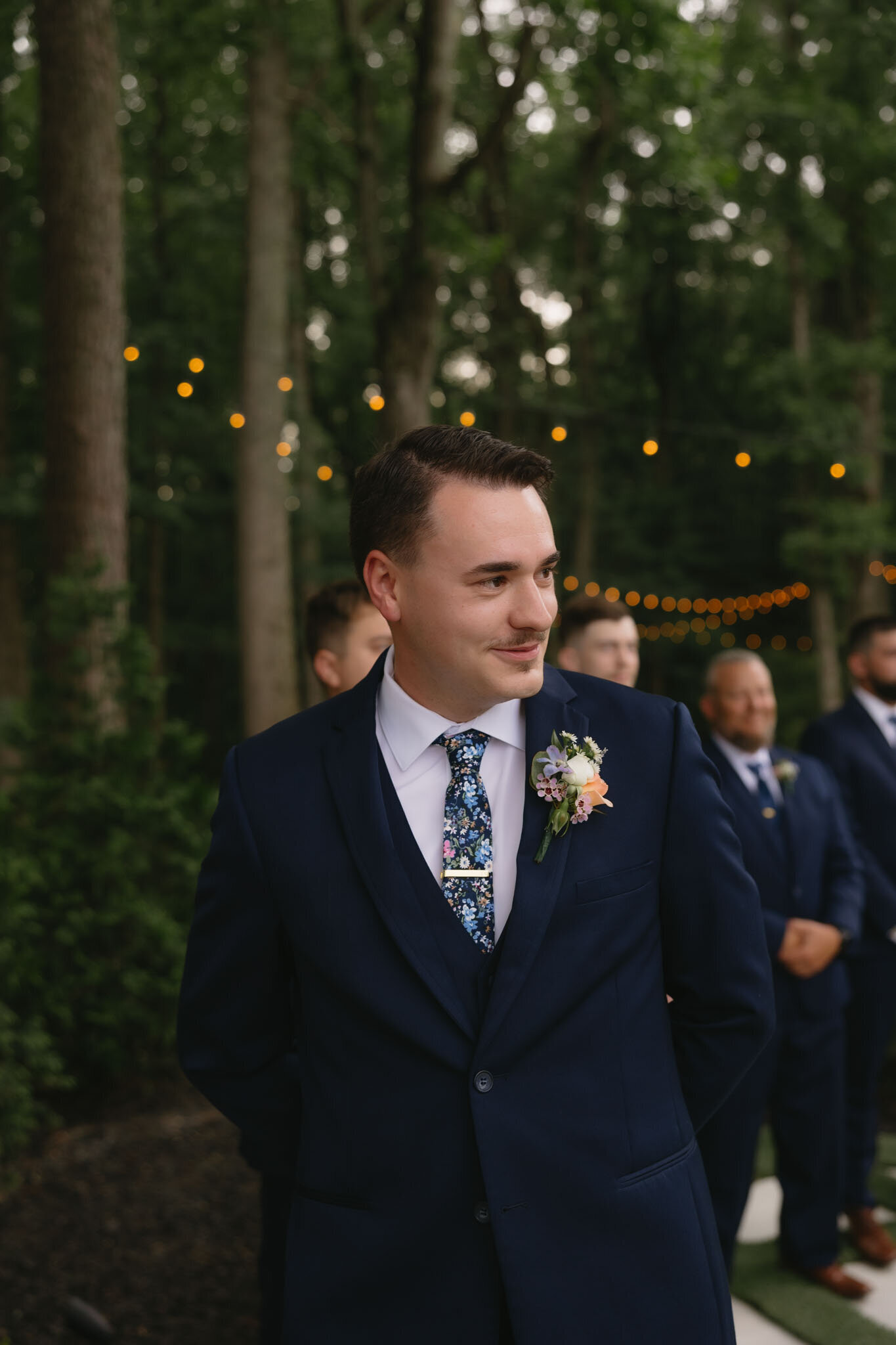 View of groom and his groomsmen in the back