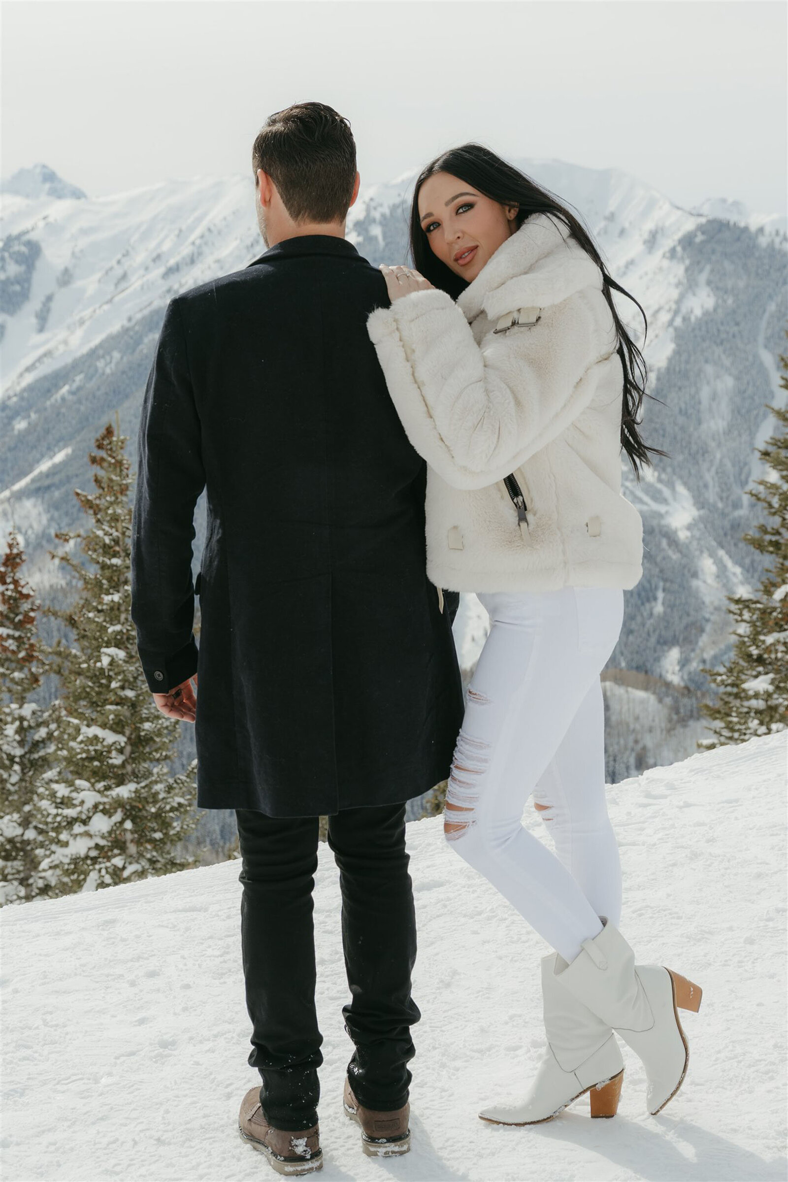 Fashion-forward winter engagement outfits in Aspen, Colorado