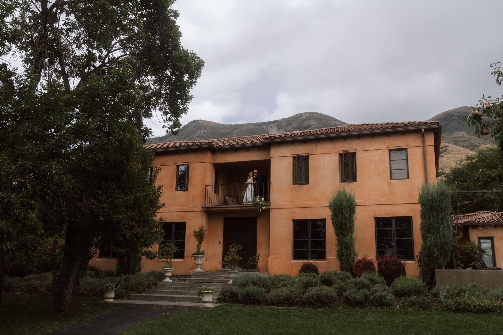 Wedding couple running through Tuscany Villa
