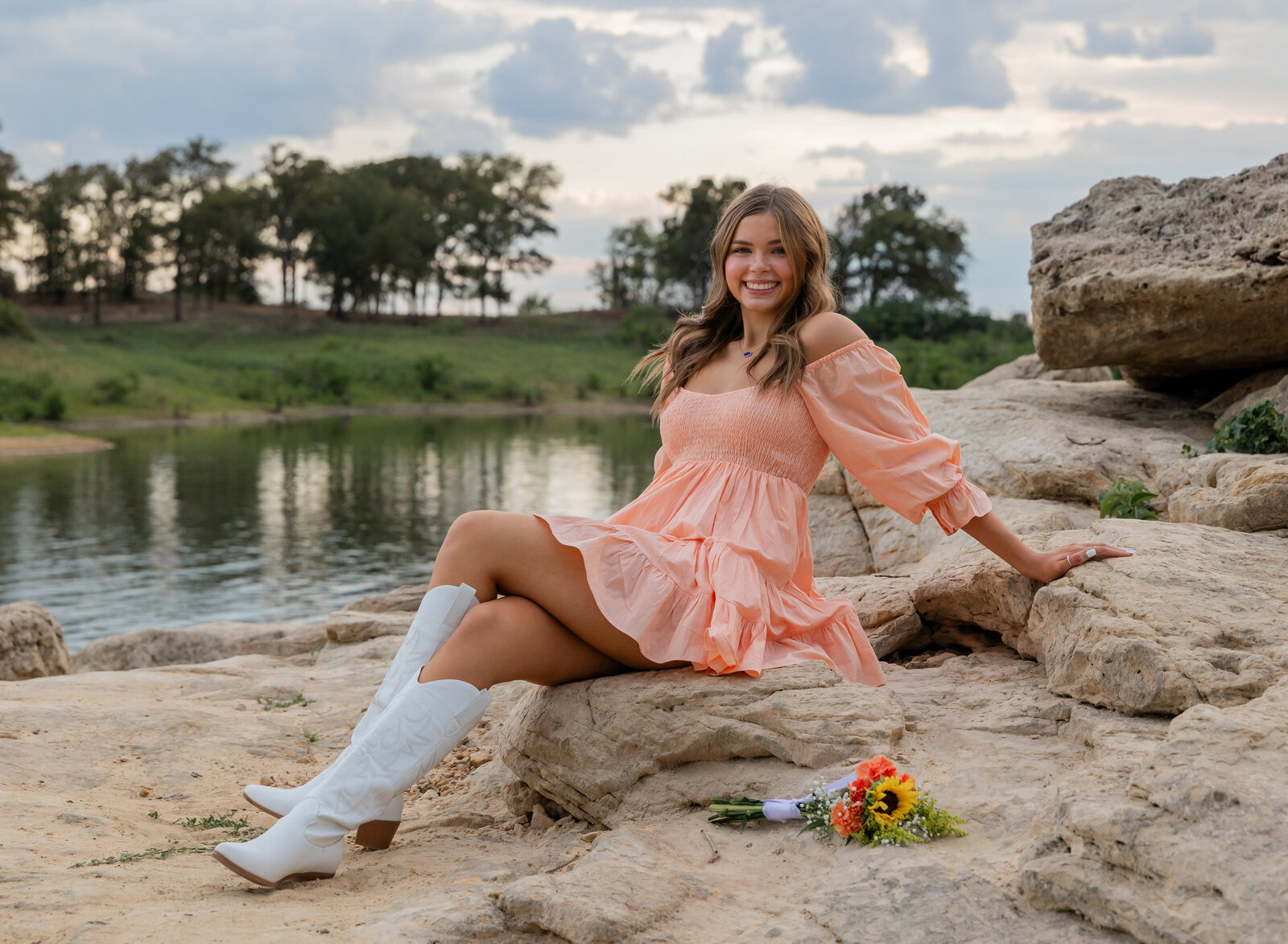senior girl on rocky ledge