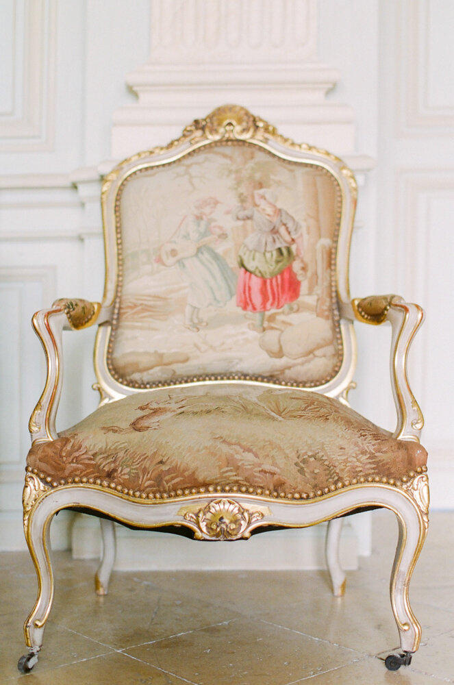 beige French formal chair with hand painted fabric