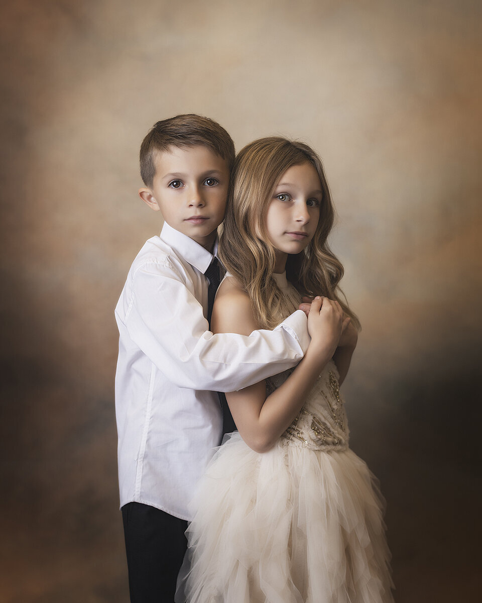 Siblings  hug at Fine Art photoshoot