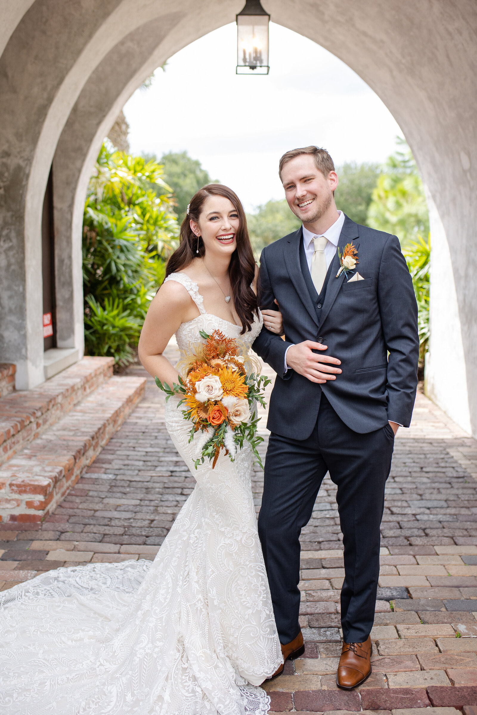 Newlywed bride and groom Florida wedding photographer.