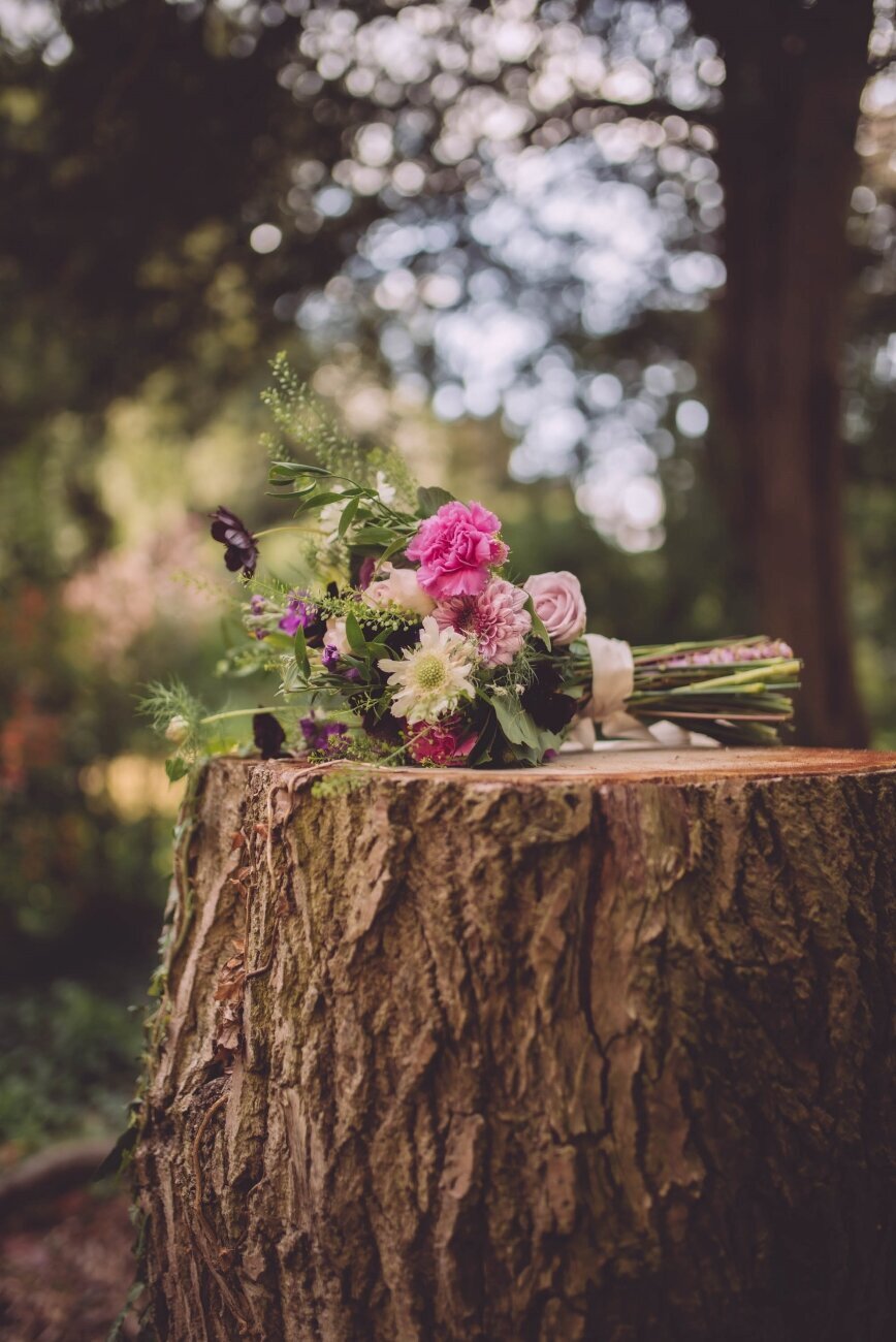 bouquet on tree stump
