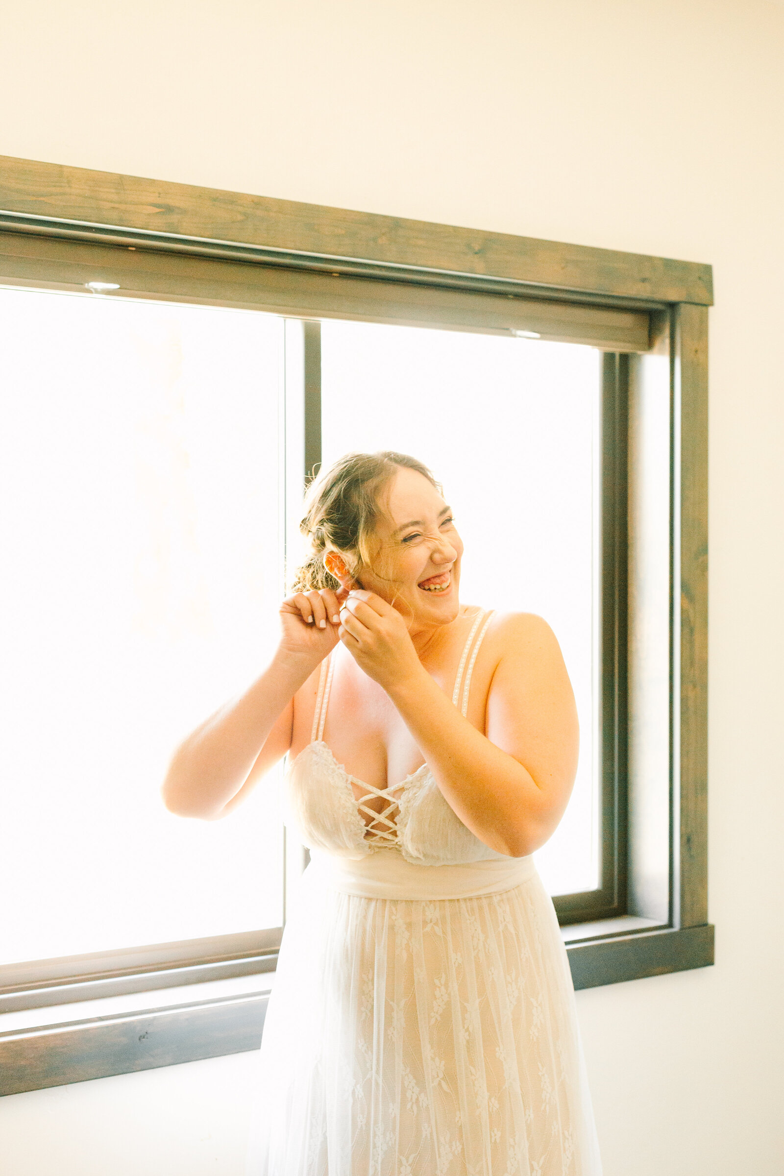 A boho bride celebrates her intimate elopement at a cabin at Big Bear Lake, California.