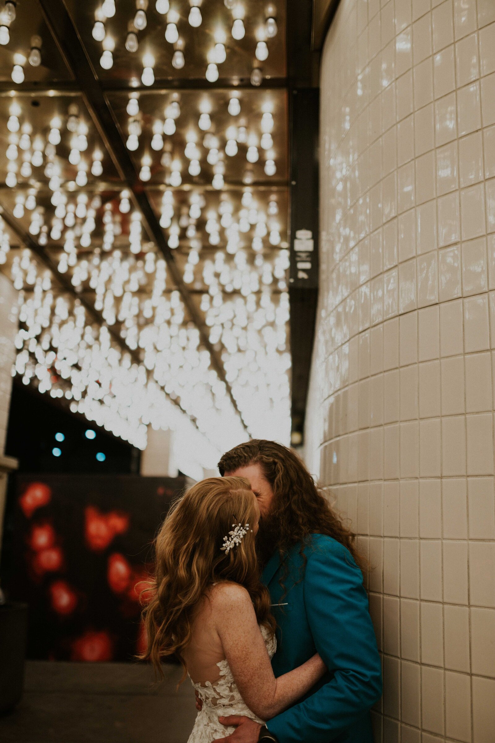 Couple kissing under the lights on Fremont Street