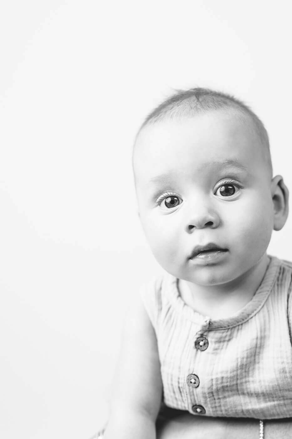 Infant staring at Tampa photographer intently