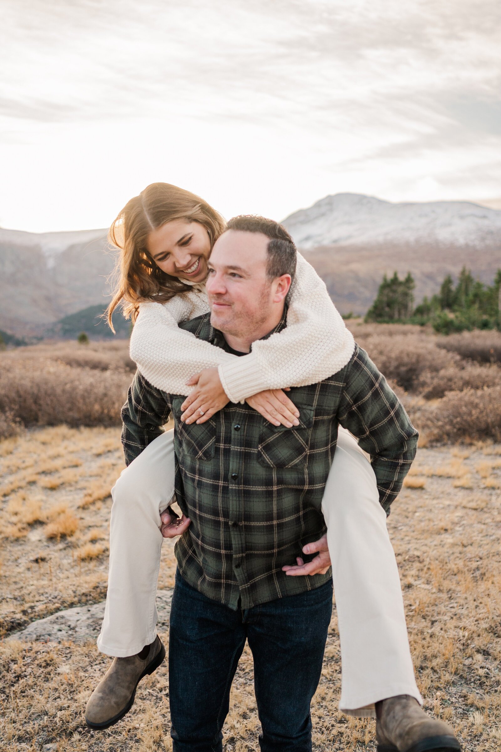Create unforgettable memories with a "just because" photoshoot in the beautiful Colorado landscape. Samantha Immer captures the joy, love, and beauty of your relationship.