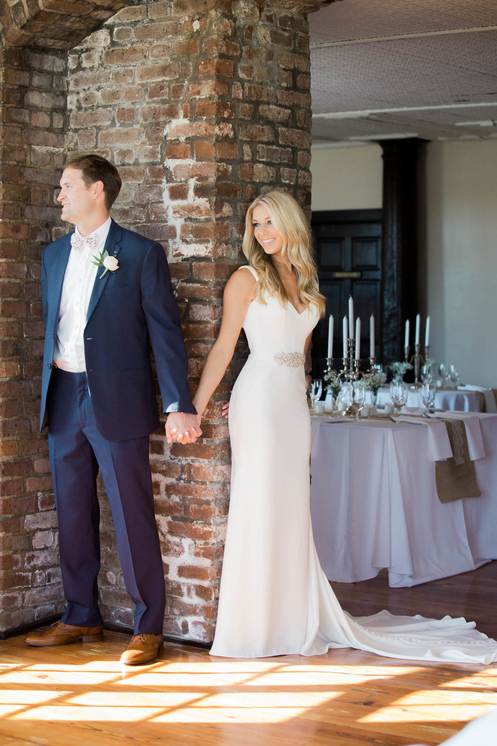 Bride and groom have no peeking meeting, Rice Mill Building, Charleston, South Carolina