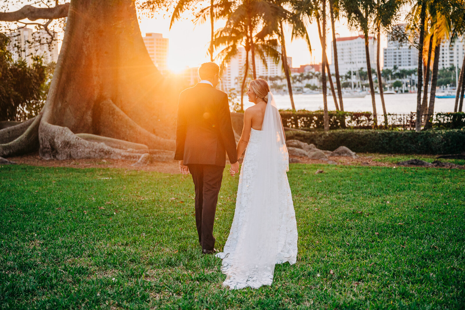 wedding couple at sunset at the royal poinciana chapel in palm beach