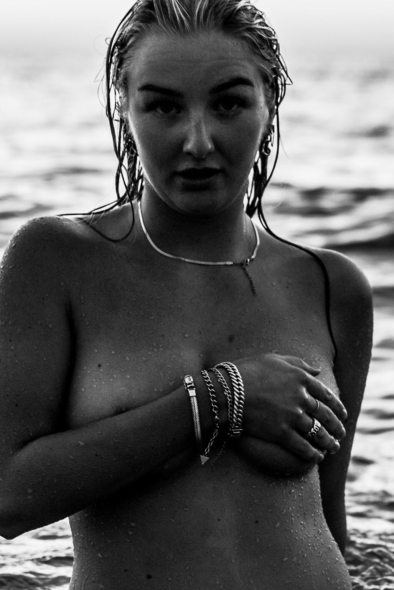 Close-up of windswept hair and sun-kissed skin during a beach empowerment shoot